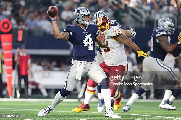 Dallas Cowboys quarterback Dak Prescott looks downfield for an open receiver during the NFL game between the Dallas Cowboys and the Washington...