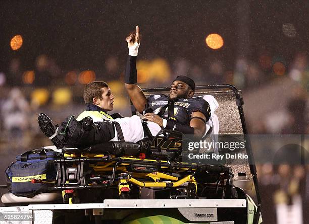 Justin Ferguson of the Western Michigan Broncos gets taken off the field on a stretcher after being hit during the game against the Toledo Rockets at...