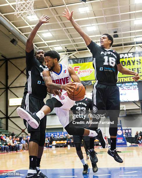 Jeff Newberry of the Grand Rapids Drive looks to pass under the basket in a game against the Austin Spurs at The DeltaPlex Arena on November 25, 2016...