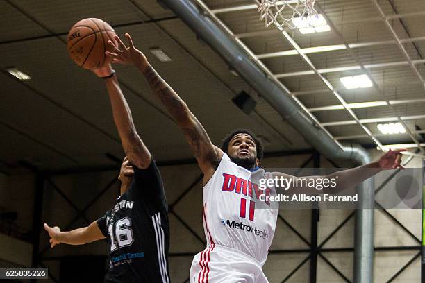Jarell Eddie of the Austin Spurs steals the ball from Jeff Newberry of the Grand Rapids Drive at The DeltaPlex Arena on November 25, 2016 in Walker,...