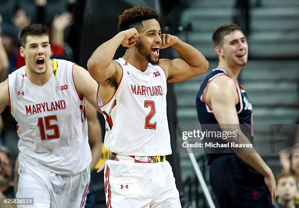 Melo Trimble of the Maryland Terrapins celebrates with Michal Cekovsky after a basket against the Richmond Spiders in the second half during the...