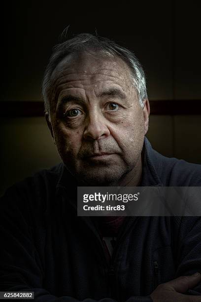 mature man gritty portrait close-up - reportage portrait stock pictures, royalty-free photos & images