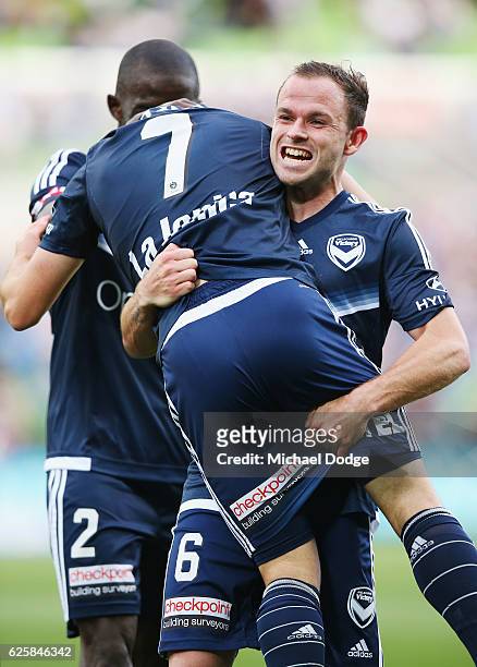 Marco Rojas of the Victory celebrates a goal as he gets lifted by Leigh Broxham of the Victory during the round eight A-League match between...