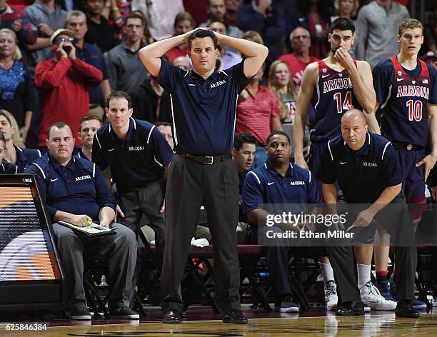 Director of Basketball Operations Ryan Reynolds, associate head coach Joe Pasternack, head coach Sean Miller, assistant coaches Emanuel Richardson...