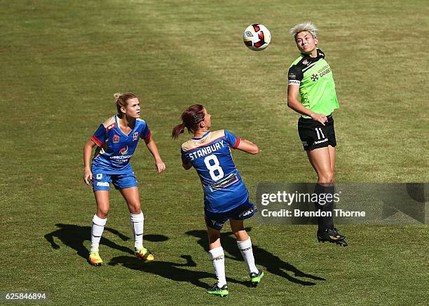 Michelle Heyman of Canberra heads the ball during the round four W-League match between Canberra United and the Newcastle Jets at McKellar Park on...
