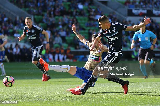 Mitch Austin of the Victory kicks the ball at goal during the round eight A-League match between Melbourne Victory and the Newcastle Jets at AAMI...