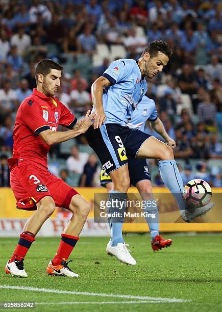 Bob of Sydney FC is challenged by Iacopo La Rocca of United during the round eight A-League match between Sydney FC and Adelaide United at Allianz...