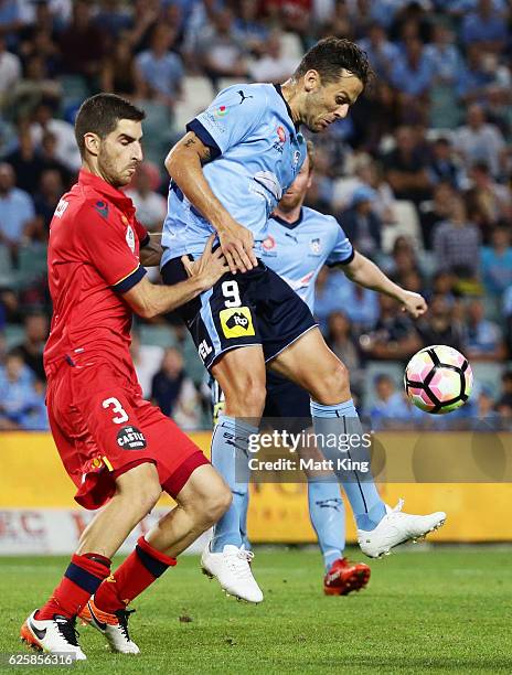 Bob of Sydney FC is challenged by Iacopo La Rocca of United during the round eight A-League match between Sydney FC and Adelaide United at Allianz...