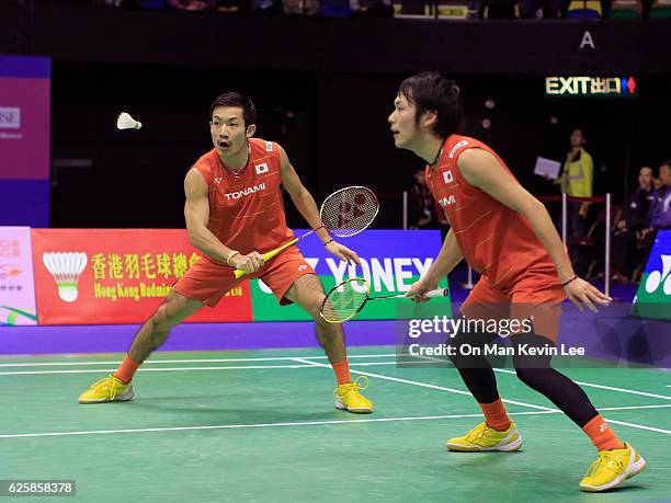 Takeshi Kamura and Keigo Sonoda of Japan in action against Chai Biao and Hong Wei of China during their Men's Doubles Semi-Final at Yonex-Sunrise...