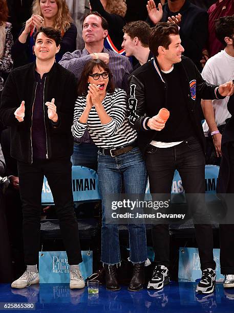 Ezra Koenig, Rashida Jones and Mark Ronson attend New York Knicks vs Charlotte Hornets game at Madison Square Garden on November 25, 2016 in New York...