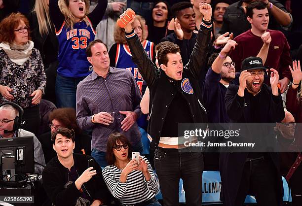 Ezra Koenig, Rashida Jones, Mark Ronson and guest attend New York Knicks vs Charlotte Hornets game at Madison Square Garden on November 25, 2016 in...