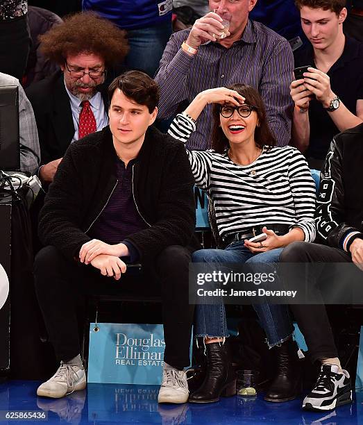 Ezra Koenig and Rashida Jones attend New York Knicks vs Charlotte Hornets game at Madison Square Garden on November 25, 2016 in New York City.
