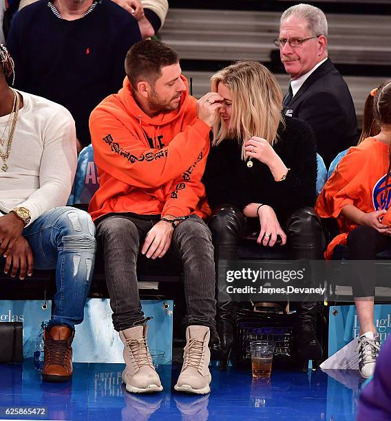 Ashley Benson and guest attend New York Knicks vs Charlotte Hornets game at Madison Square Garden on November 25, 2016 in New York City.