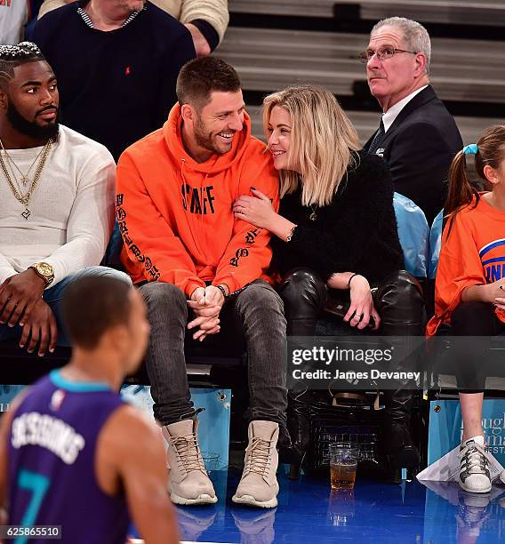 Ashley Benson and guest attend New York Knicks vs Charlotte Hornets game at Madison Square Garden on November 25, 2016 in New York City.