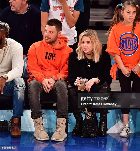 Ashley Benson and guest attend New York Knicks vs Charlotte Hornets game at Madison Square Garden on November 25, 2016 in New York City.