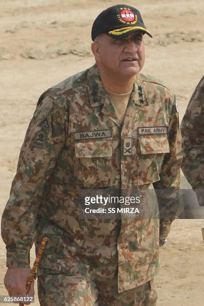 In this photograph taken on November 16 Pakistani Army General Qamar Javed Bajwa arrives to attend a military exercise on the Indian border in...