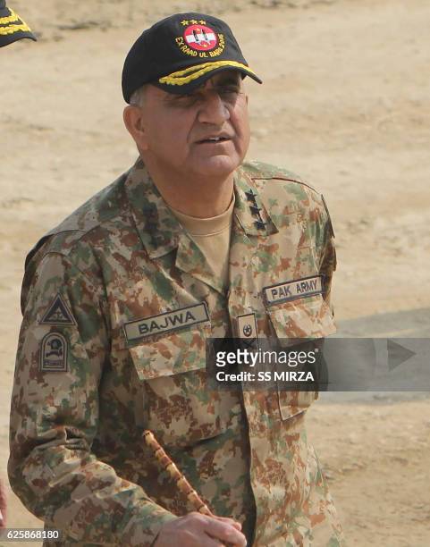 In this photograph taken on November 16 Pakistani Army General Qamar Javed Bajwa arrives to attend a military exercise on the Indian border in...