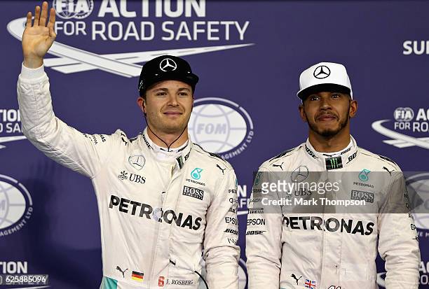 Top two qualifiers and World Drivers Championship contenders Lewis Hamilton of Great Britain and Mercedes GP and Nico Rosberg of Germany and Mercedes...