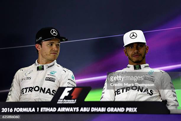 Top two qualifiers and World Drivers Championship contenders Lewis Hamilton of Great Britain and Mercedes GP and Nico Rosberg of Germany and Mercedes...