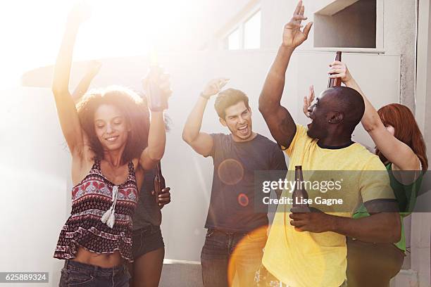 group of friends partying - lise gagne stock pictures, royalty-free photos & images