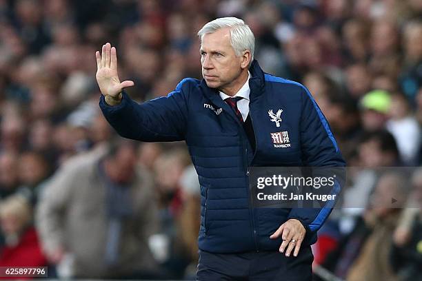 Alan Pardew, Manager of Crystal Palace gestures during the Premier League match between Swansea City and Crystal Palace at Liberty Stadium on...