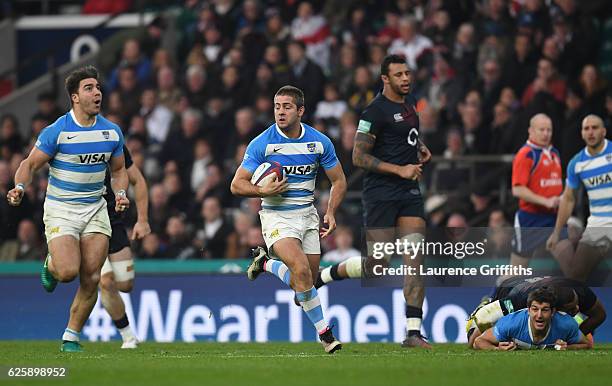 Santiago Cordero of Argentina breaks through to score his sides second try during the Old Mutual Wealth Series match between England and Argentina at...