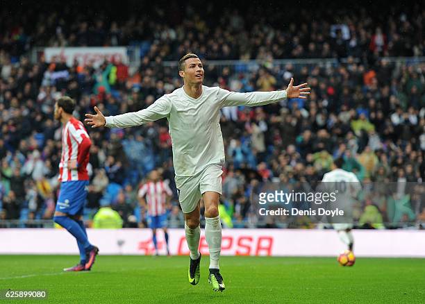 Cristiano Ronaldo of Real Madrid celebrates after scoring Real's 2nd goal from during the La Liga match between Real Madrid CF and Real Sporting de...