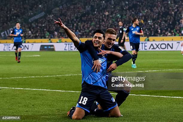 Nadiem Amiri of Hoffenheim celebrates with Pavel Kaderabek after scoring a goal to make it 1-1 during the Bundesliga match between Borussia...