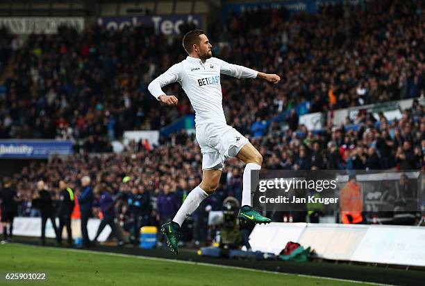 Gylfi Sigurdsson of Swansea City celebrates scoring his team's first goal during the Premier League match between Swansea City and Crystal Palace at...