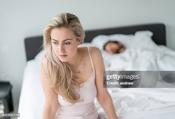 tired woman suffering from insomnia - woman bedroom sleeping bildbanksfoton och bilder