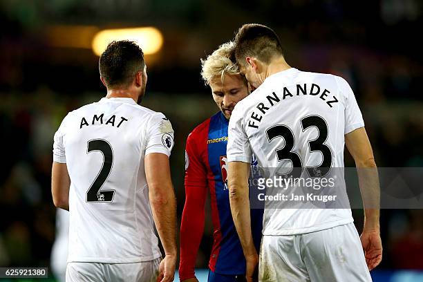 Yohan Cabaye of Crystal Palace and Federico Fernandez of Swansea City square off during the Premier League match between Swansea City and Crystal...