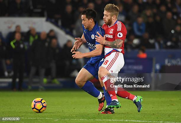 Shinji Okazaki of Leicester City is fouled by Adam Clayton of Middlesbrough during the Premier League match between Leicester City and Middlesbrough...