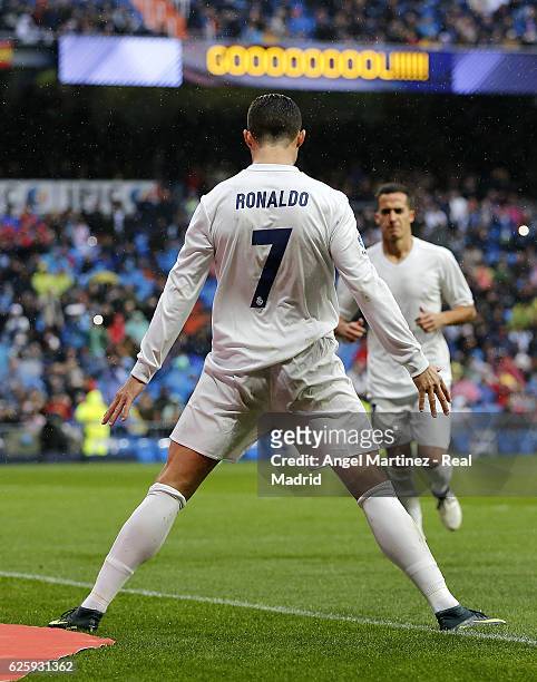 Cristiano Ronaldo of Real Madrid celebrates after scoring the opening goal during the La Liga match between Real Madrid CF and Real Sporting de Gijon...