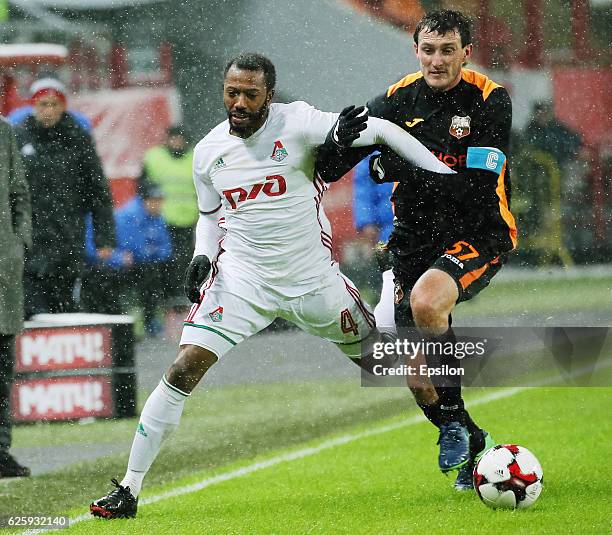 Manuel Fernandes of FC Lokomotiv Moscow and Artem Fidler of FC Ural Ekaterinburg vie for the ball during the Russian Football League match between FC...