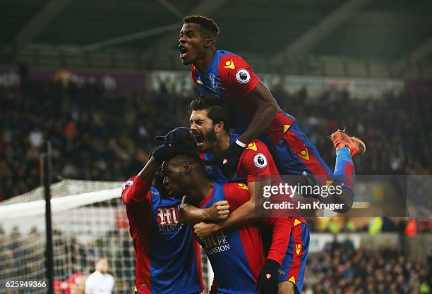 Christian Benteke of Crystal Palace celebrates scoring his team's fourth goal with his team mates incluidng Wilfried Zaha during the Premier League...