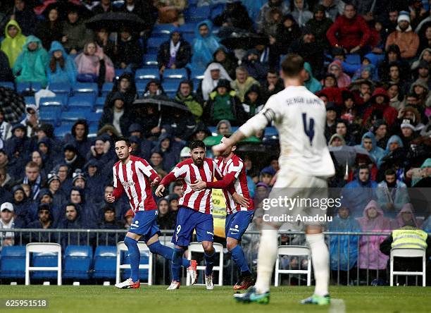 Carlos Carmona of Sporting de Gijon celebrates scoring a goal during the La Liga football match between Real Madrid and Real Sporting de Gijon at...