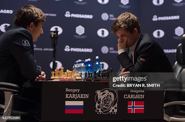 Sergey Karjakin , Russian chess grandmaster, plays against Magnus Carlsen, Norwegian chess grandmaster and current World Chess Champion, during round...