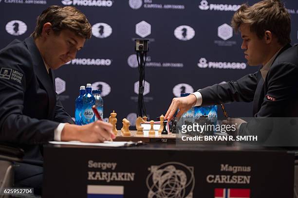 Sergey Karjakin , Russian chess grandmaster, plays against Magnus Carlsen, Norwegian chess grandmaster and current World Chess Champion, during round...