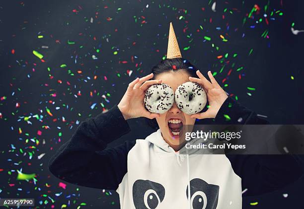 girl with white donuts in front of her eyes and ice cone on head - hundreds and thousands stock pictures, royalty-free photos & images