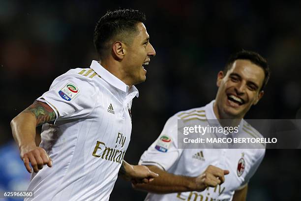 Milan's Italian forward Gianluca Lapadula celebrates after scoring a goal during the Italian Serie A football match between Empoli and AC Milan on...