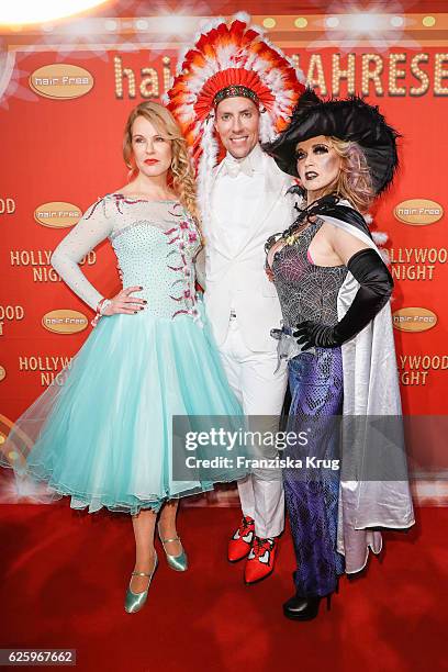 German moderator Katja Burkard, Hairfree founder Jens Hilbert and german actress Tina Ruland attend the Hollywood Superhero Fairytale Night hosted by...