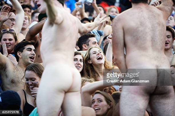 Naked fans cheer during the game between the Yale Bulldogs and the Harvard Crimson at Harvard Stadium on November 19, 2016 in Boston, Massachusetts.