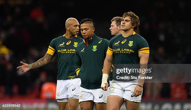 Springboks fly half Elton Jantjies and team mates react after the International match between Wales and South Africa at Principality Stadium on...