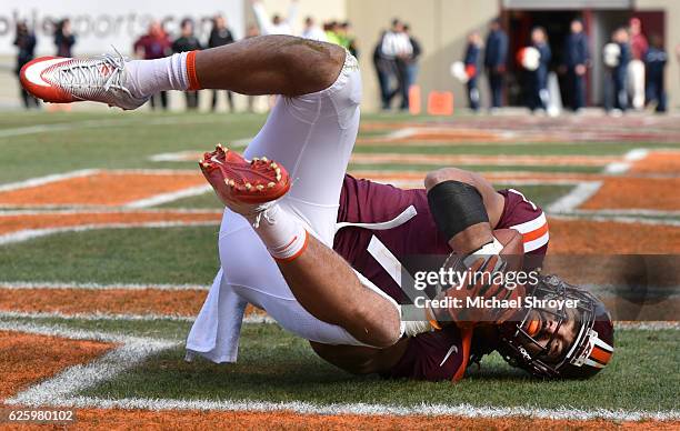 Tight end Bucky Hodges of the Virginia Tech Hokies makes a touchdown reception against the Virginia Cavaliers at Lane Stadium on November 26, 2016 in...