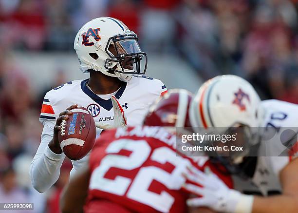 Jeremy Johnson of the Auburn Tigers looks to pass against the Alabama Crimson Tide at Bryant-Denny Stadium on November 26, 2016 in Tuscaloosa,...