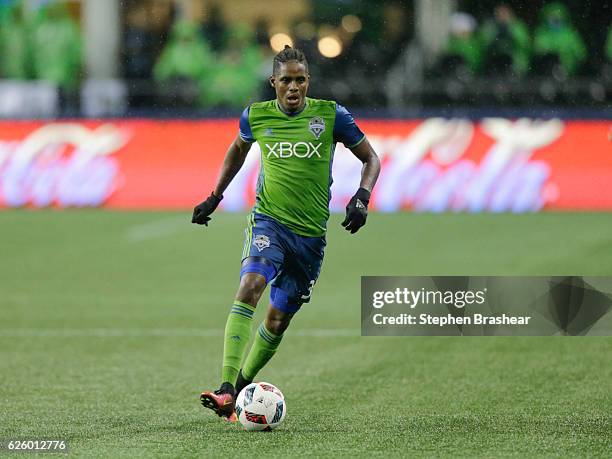 Joevin Jones of the Seattle Sounders dribbles the ball during a match against the Colorado Rapids in the first leg of the Western Conference Finals...