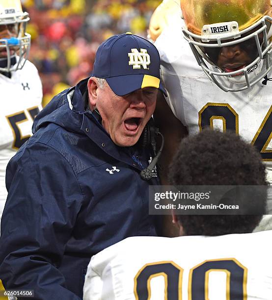 Head coach Brian Kelly of the Notre Dame Fighting Irish shouts at Jerry Tillery on the bench in the fourth quarter of the game against the USC...