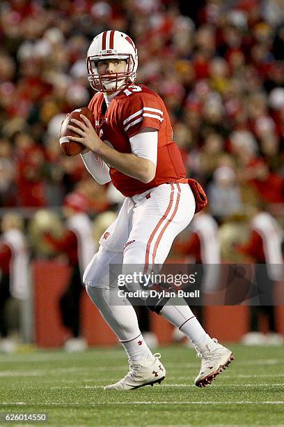 Bart Houston of the Wisconsin Badgers drops back to pass in the third quarter against the Minnesota Golden Gophers at Camp Randall Stadium on...