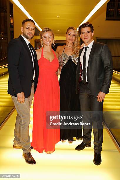 Mike Adler , Kira Kuhnert and Philipp Danne with his girlfriend Viktoria Schuessler attend the charity event dolphin aid gala 'Dolphin's Night' at...