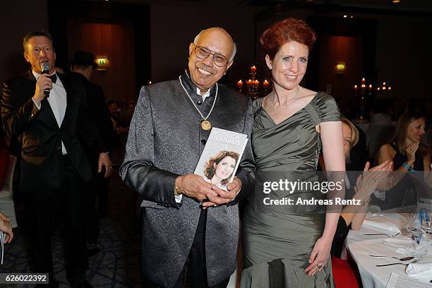 Monica Lierhaus auctioned her signed book 'Immer Noch Ich' to Anisur Rahman during the charity event dolphin aid gala - 'Dolphin's Night' at...